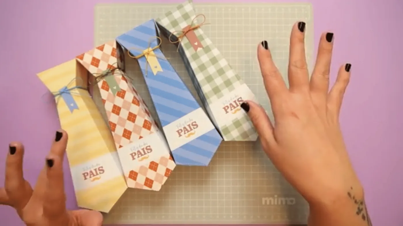 Quatro porta bombons gravata em estampas diferentes